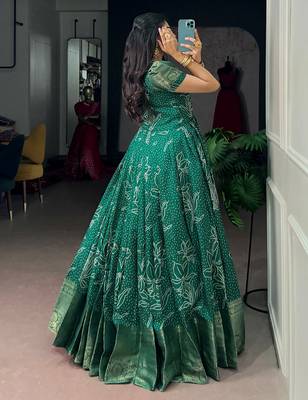 Mesmerizing Green Zari Weaving Cotton Function Wear Gown 4