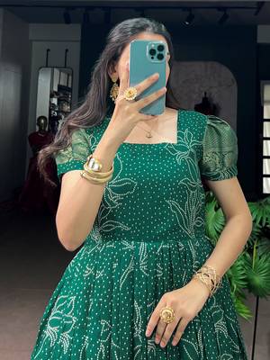 Mesmerizing Green Zari Weaving Cotton Function Wear Gown 5