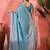 Teal embellished banarasi saree with blouse piece