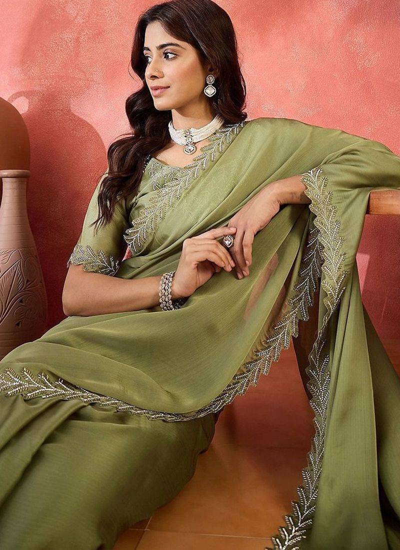 Sea green embellished banarasi saree with blouse piece