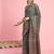 Teal ethnic printed saree with blouse piece