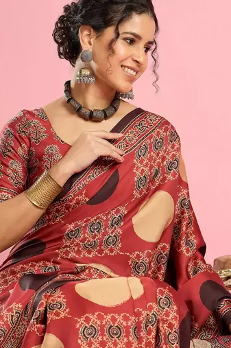 Rust ethnic ajrak printed saree with blouse piece