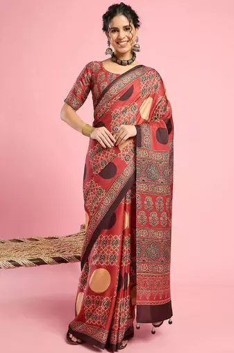 Rust ethnic ajrak printed saree with blouse piece