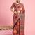 Rust ethnic ajrak printed saree with blouse piece