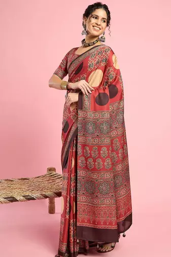 Rust ethnic ajrak printed saree with blouse piece
