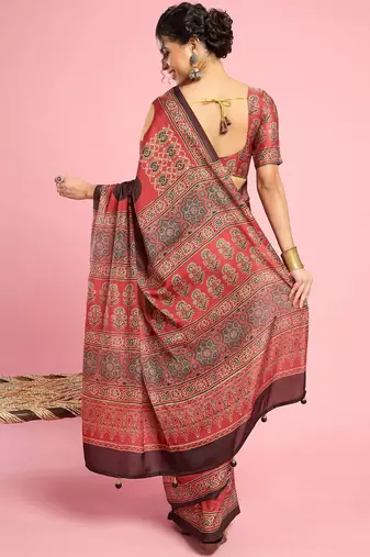 Rust ethnic ajrak printed saree with blouse piece