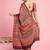 Rust ethnic ajrak printed saree with blouse piece