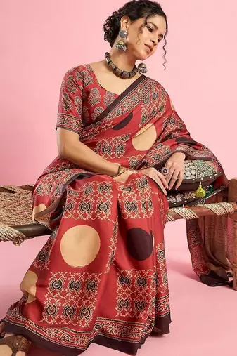 Rust ethnic ajrak printed saree with blouse piece