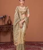 Beige kalamkari printed embroidered banarasi saree with matching blouse