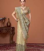 Beige kalamkari printed kantha work tussar saree with matching blouse
