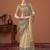 Beige printed saree with matching blouse