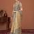 Beige printed saree with matching blouse