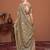 Beige printed saree with matching blouse