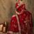Maroon floral embroidered net sarees