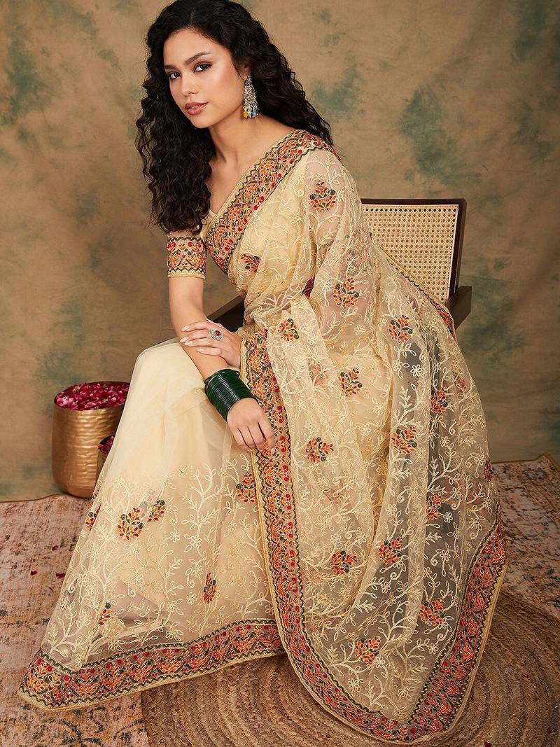 Beige yellow beige embroidered net sarees
