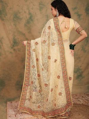 Beige yellow beige embroidered net sarees 4
