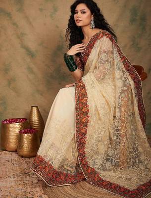 White ethnic motifs embroidered net saree 1