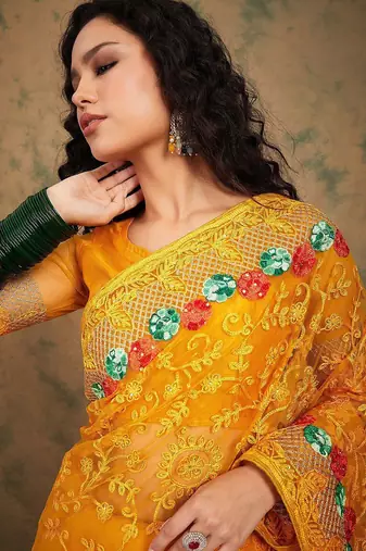 Yellow yellow floral embroidered net sarees
