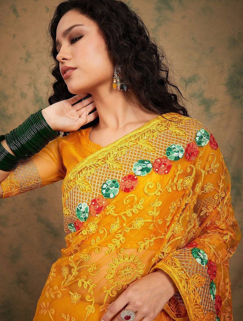 Yellow yellow floral embroidered net sarees