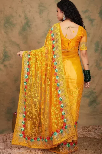 Yellow yellow floral embroidered net sarees