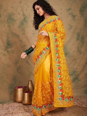 Yellow yellow floral embroidered net sarees 4