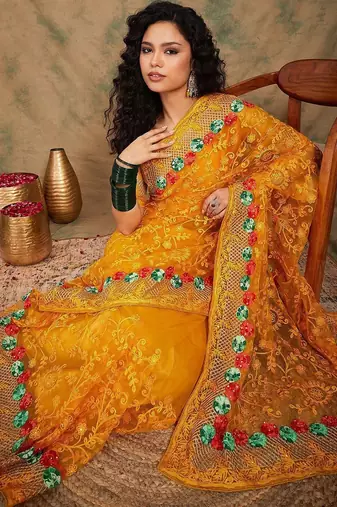 Yellow yellow floral embroidered net sarees