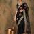 Black black ethnic motifs beads & stones embroidered net saree