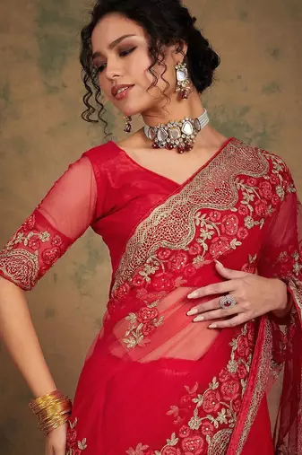 Red ethnic motifs embroidered net saree