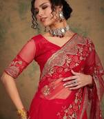 Red ethnic motifs embroidered net saree