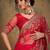 Red ethnic motifs embroidered net saree