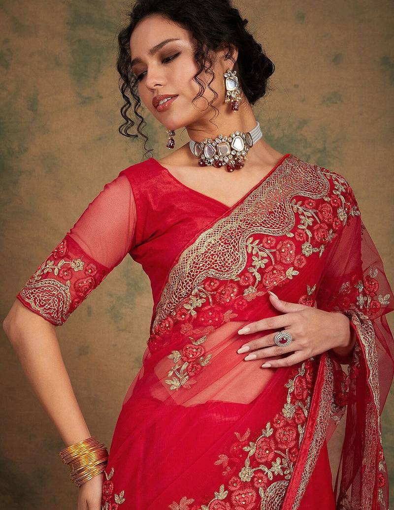 Red ethnic motifs embroidered net saree