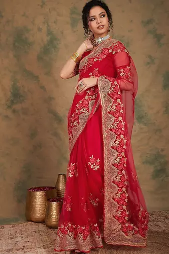 Red ethnic motifs embroidered net saree