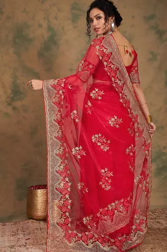 Red ethnic motifs embroidered net saree
