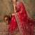 Red ethnic motifs embroidered net saree