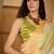 Yellow abstract printed saree with unstitched blouse