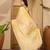 Yellow abstract printed saree with unstitched blouse