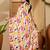 White abstract printed saree with unstitched blouse