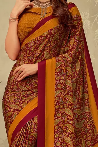 Maroon printed saree with blouse piece