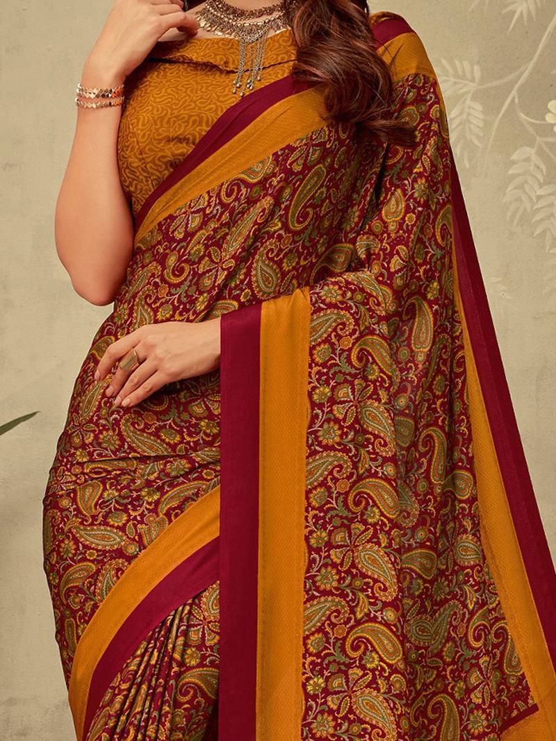 Maroon printed saree with blouse piece