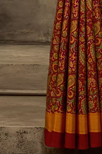 Maroon printed saree with blouse piece