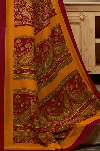 Maroon printed saree with blouse piece
