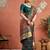 Green woven design tussar saree with blouse