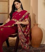 Magenta floral embroidered belted  georgette saree with blouse piece