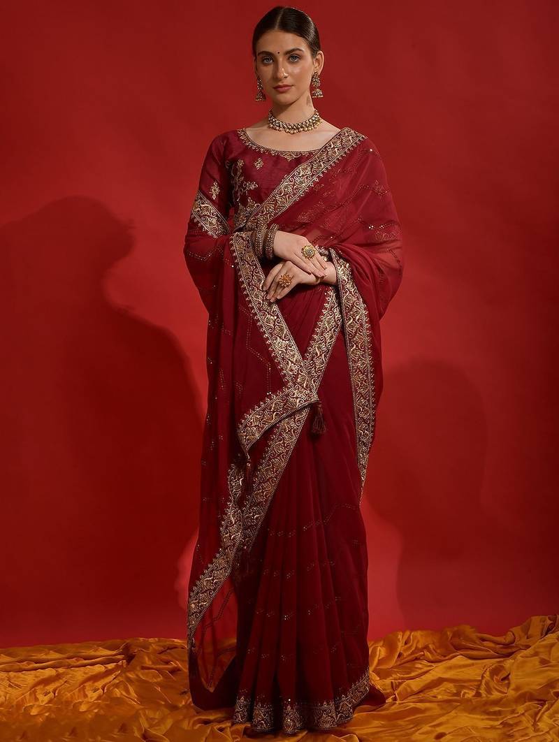 Maroon georgette embroidered saree with matching blouse