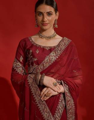 Maroon georgette embroidered saree with matching blouse 4