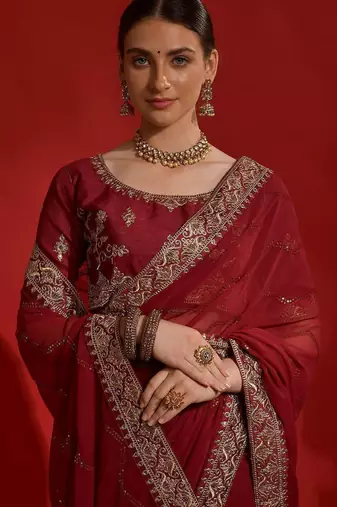 Maroon georgette embroidered saree with matching blouse