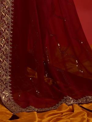 Maroon georgette embroidered saree with matching blouse 5