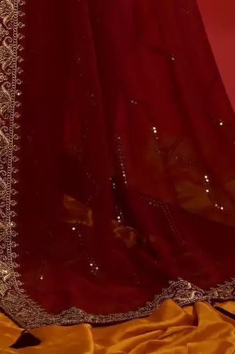 Maroon georgette embroidered saree with matching blouse