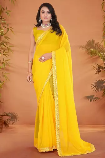 Yellow embellished georgette saree with matching blouse