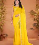 Yellow embellished georgette saree with matching blouse
